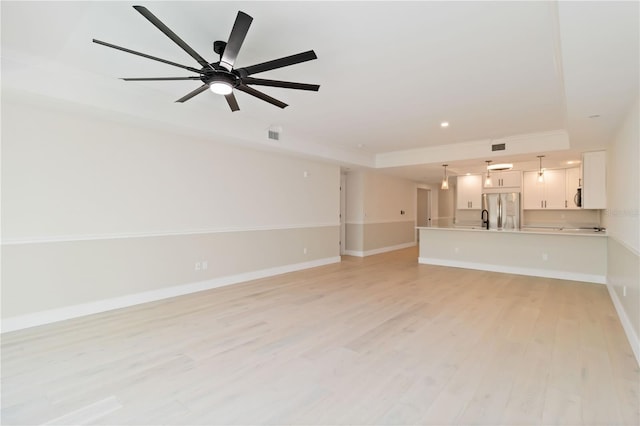 280 Hidden Bay Dr Unit 202, Osprey, FL 34229 - unfurnished living room featuring light wood-style floors, baseboards, ceiling fan, recessed lighting, and ornamental molding