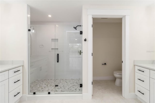 280 Hidden Bay Dr Unit 202, Osprey, FL 34229 - full bath featuring a stall shower, baseboards, toilet, and recessed lighting