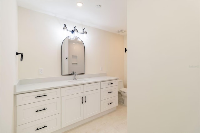 280 Hidden Bay Dr Unit 202, Osprey, FL 34229 - bathroom with toilet, vanity, and recessed lighting