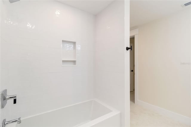 280 Hidden Bay Dr Unit 202, Osprey, FL 34229 - bathroom with tub / shower combination and baseboards