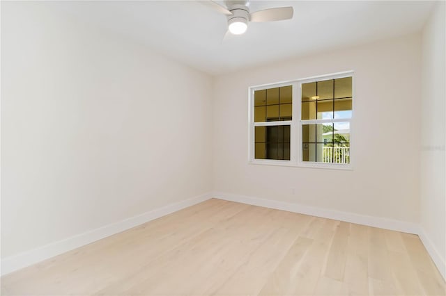 280 Hidden Bay Dr Unit 202, Osprey, FL 34229 - spare room with light wood-style flooring, baseboards, and ceiling fan