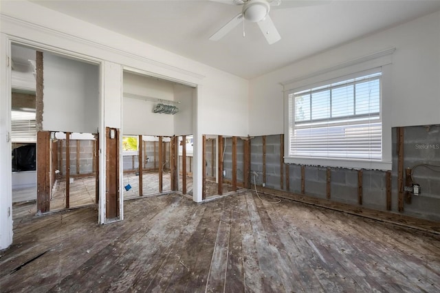 unfurnished room with ceiling fan and hardwood / wood-style floors