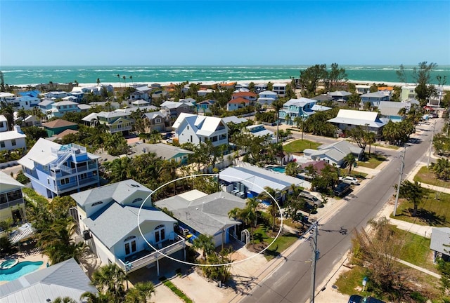 aerial view featuring a residential view and a water view