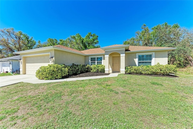 ranch-style home with a garage, a front yard, concrete driveway, and stucco siding