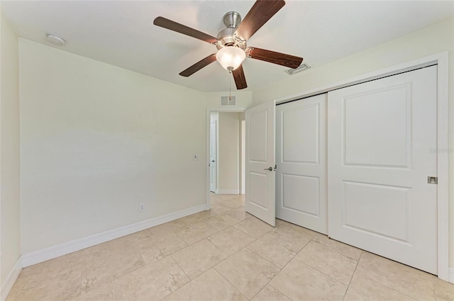 unfurnished bedroom featuring a closet, visible vents, and baseboards