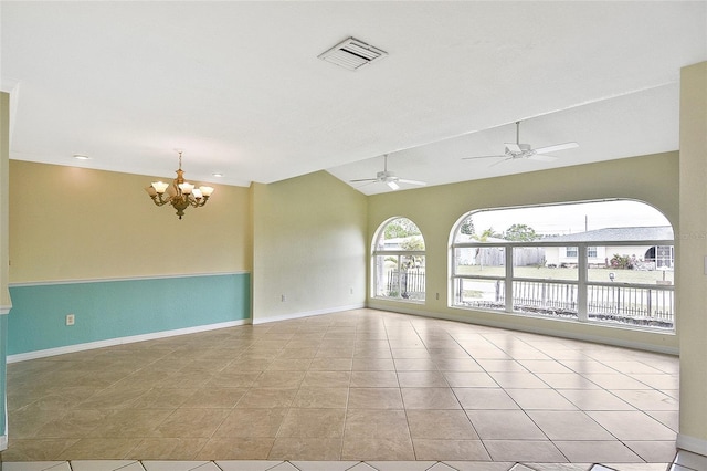 tiled spare room featuring lofted ceiling, baseboards, visible vents, and ceiling fan with notable chandelier