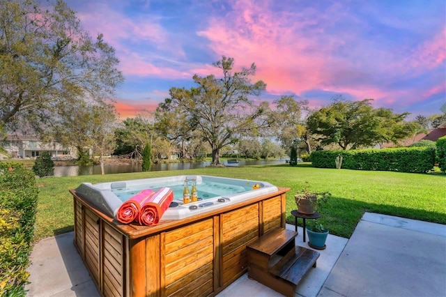 view of patio with a hot tub