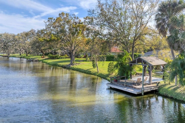 dock area with a gazebo and a water view