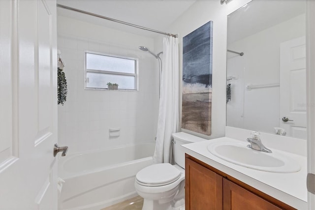 bathroom featuring shower / bathtub combination with curtain, toilet, and vanity