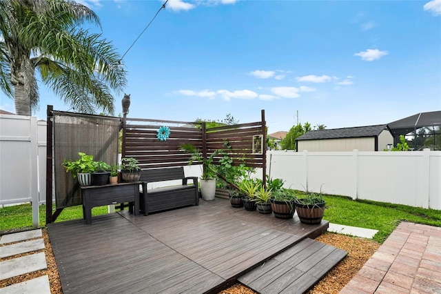 wooden deck featuring fence