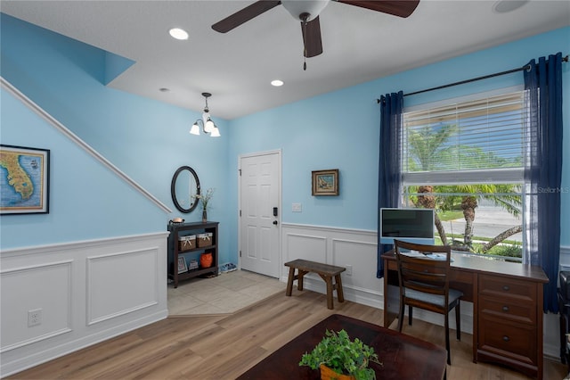 office area with a ceiling fan, recessed lighting, light wood-style floors, and wainscoting