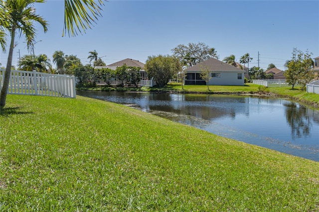 view of water feature with fence