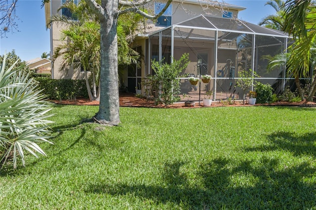 view of yard featuring a lanai