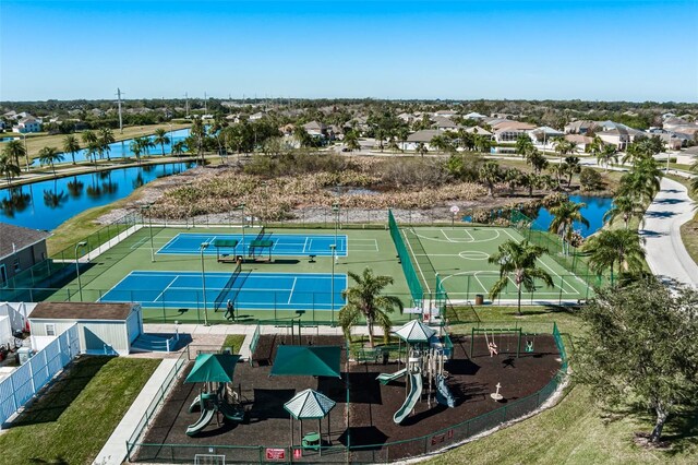 aerial view featuring a residential view and a water view