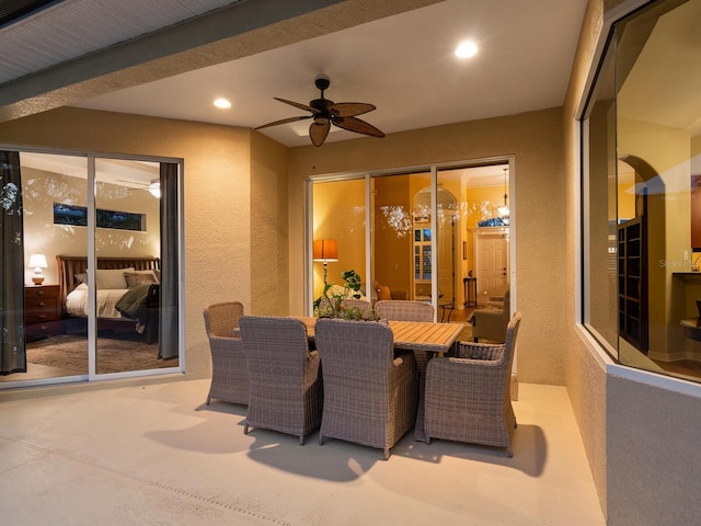 view of patio / terrace with outdoor dining space and ceiling fan