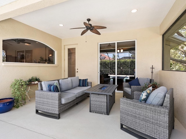 view of patio featuring a ceiling fan and an outdoor hangout area