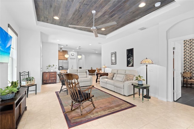 living room featuring visible vents, wood ceiling, ceiling fan, a tray ceiling, and recessed lighting