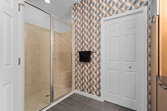 full bathroom featuring a stall shower, tile patterned flooring, a closet, and recessed lighting