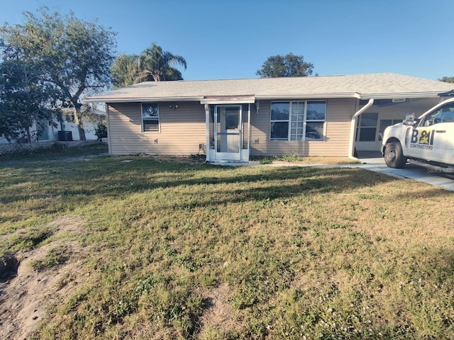 ranch-style home with a front yard