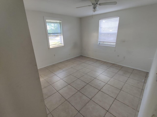 spare room featuring ceiling fan