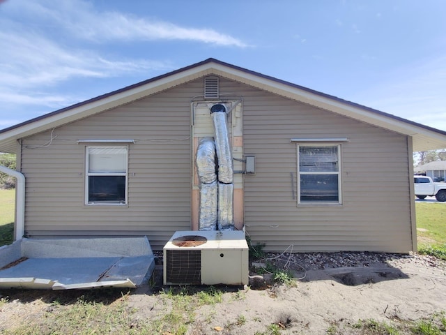 view of property exterior featuring central AC