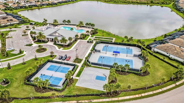 bird's eye view with a water view