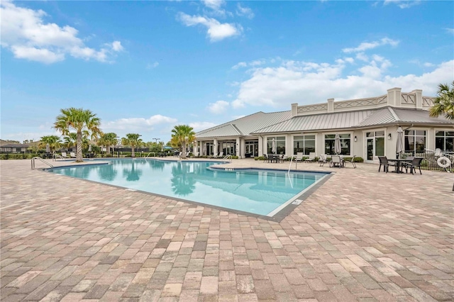 pool featuring a patio area