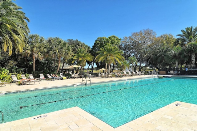 community pool featuring a patio