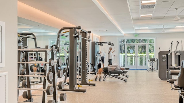 exercise room featuring french doors, a drop ceiling, plenty of natural light, and visible vents