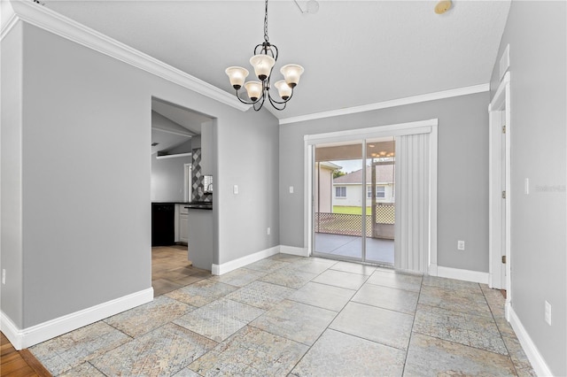 unfurnished dining area with stone tile flooring, a notable chandelier, baseboards, and crown molding