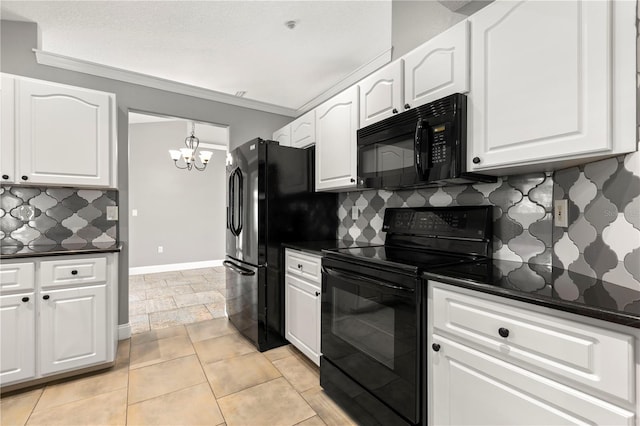 kitchen with dark countertops, baseboards, white cabinets, and black appliances