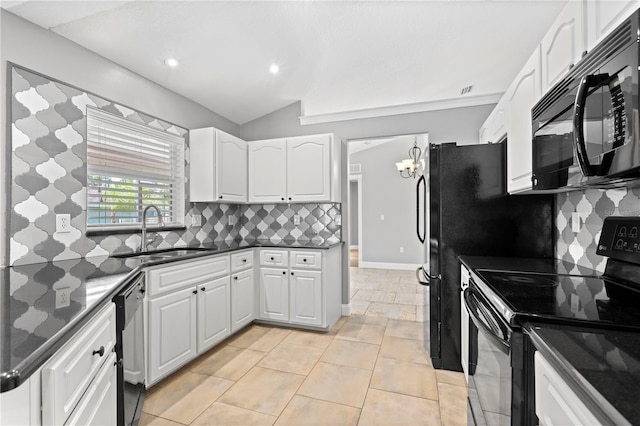 kitchen with black appliances, decorative backsplash, white cabinets, and a sink