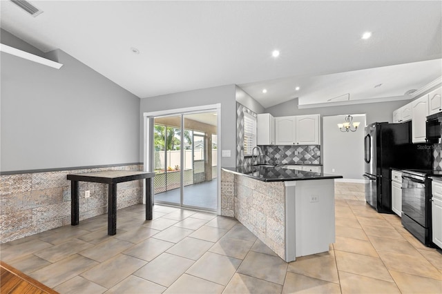 kitchen with dark countertops, white cabinetry, vaulted ceiling, and black appliances