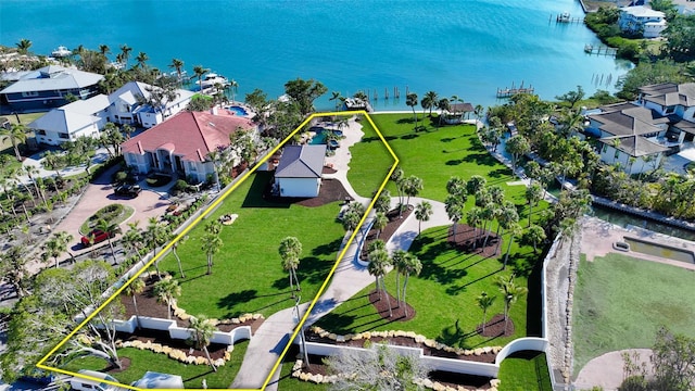 aerial view with a water view and a residential view