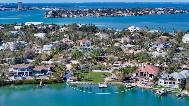 aerial view with a residential view and a water view