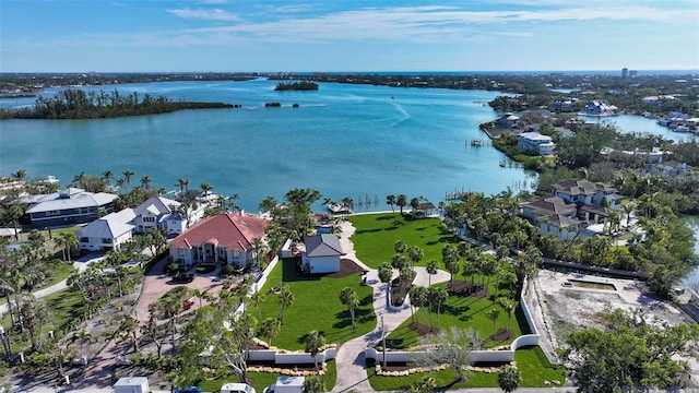 bird's eye view with a residential view and a water view