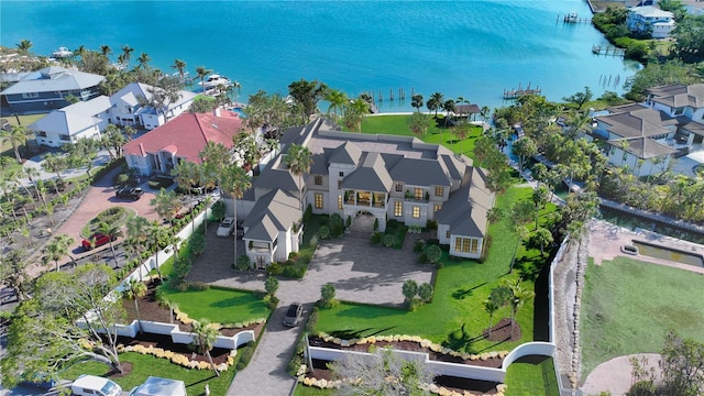 bird's eye view with a residential view and a water view