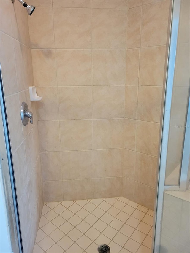 bathroom featuring a shower stall