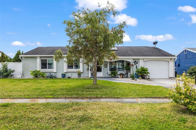 single story home with fence, a front yard, stucco siding, a garage, and driveway