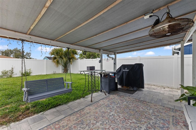 view of patio / terrace with area for grilling and a fenced backyard