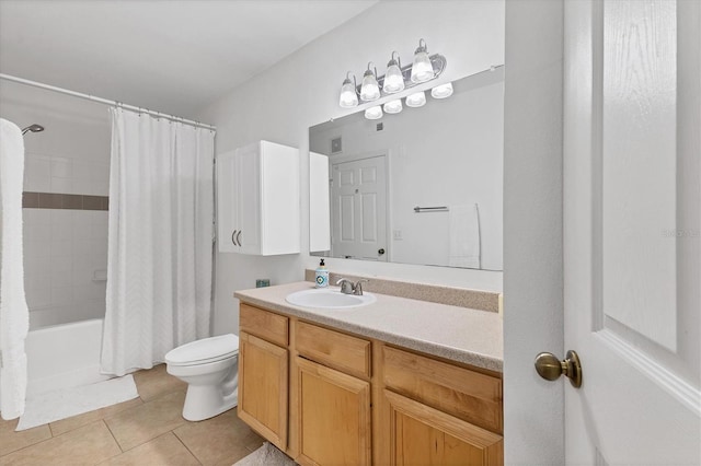 full bath featuring toilet, vanity, shower / bath combo with shower curtain, and tile patterned floors