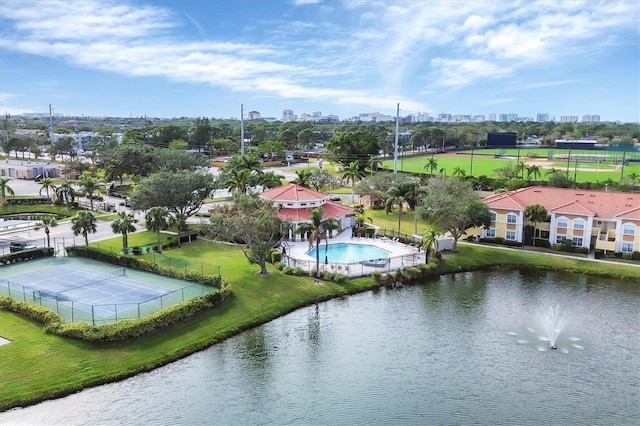 drone / aerial view featuring a water view and a city view