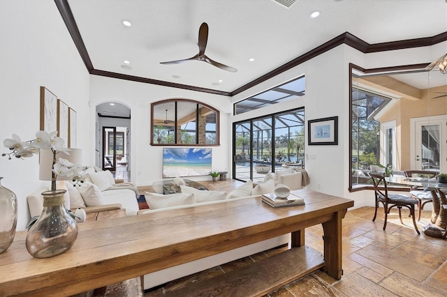 interior space featuring a ceiling fan, crown molding, stone tile floors, and recessed lighting