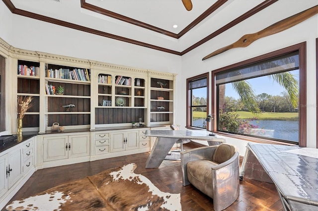 living area with ornamental molding