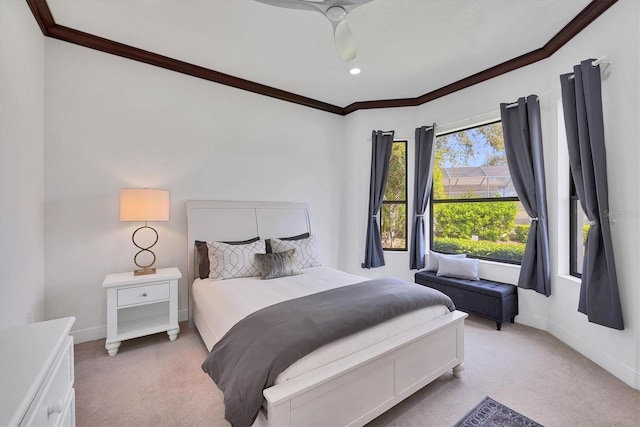 bedroom with baseboards, light carpet, and crown molding