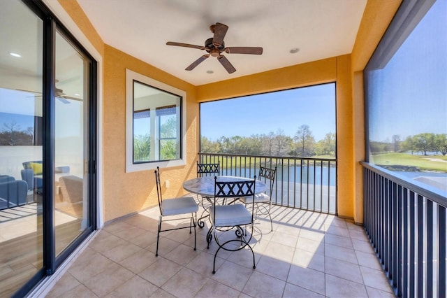 balcony featuring ceiling fan