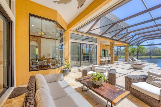 sunroom with a water view