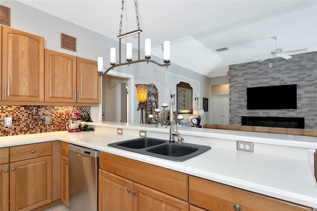 kitchen with a ceiling fan, backsplash, open floor plan, light countertops, and dishwasher