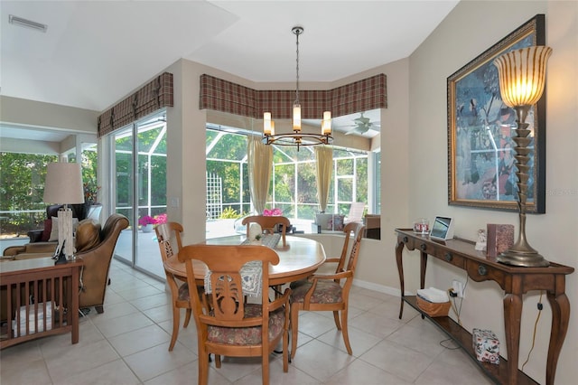 dining room with visible vents, baseboards, a notable chandelier, and light tile patterned flooring