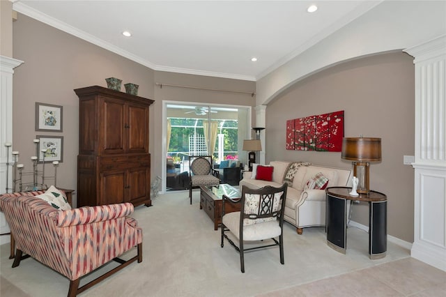 living area featuring recessed lighting, crown molding, baseboards, and decorative columns